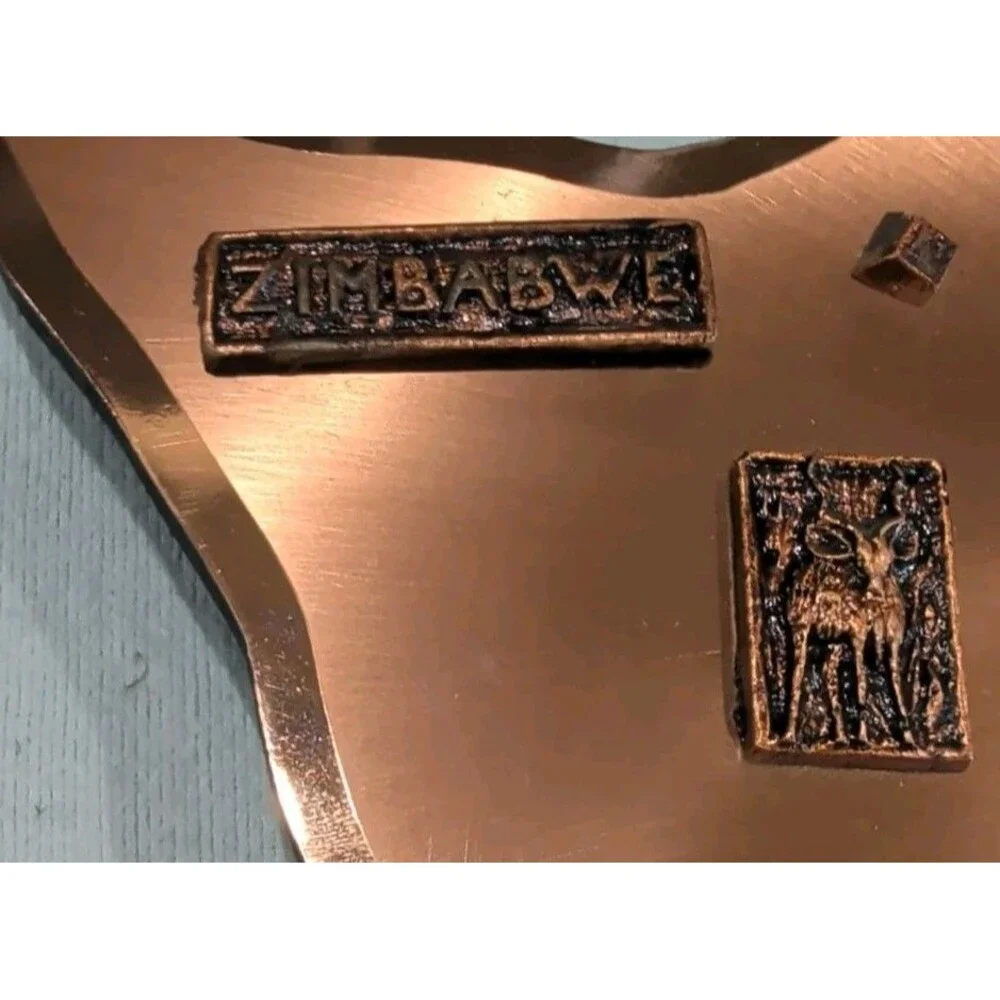 Gastone Zimbabwe Copper Brass Colored Wall Clock - Battery Powered